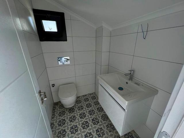 Вилла в 1000 метров от моря планировкой 3+1 в районе Фетхие 