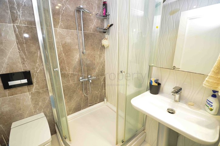 Квартира планировки 5+1 в микрорайоне Лара - Анталия 