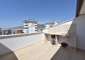 Шикарный пентхаус с четырьмя спальнями в уютном районе Тосмур