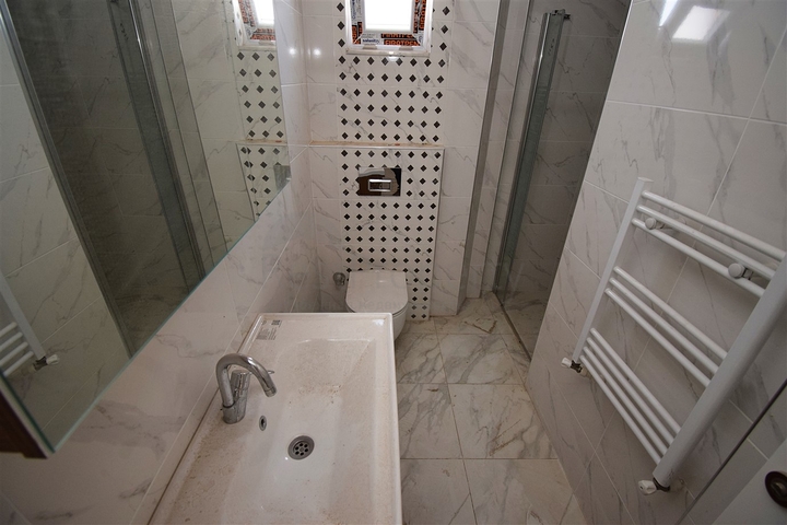 Квартира планировки 6+1 дуплекс в центре города Анталия 