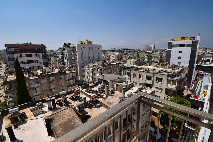 Квартира планировки 6+1 дуплекс в центре города Анталия 