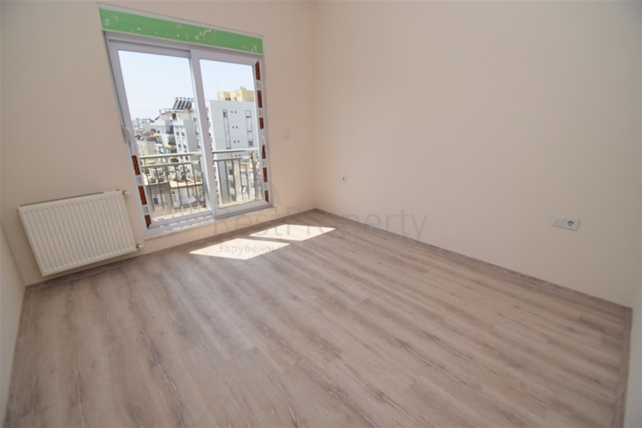 Квартира планировки 6+1 дуплекс в центре города Анталия 