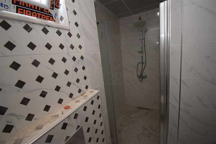 Квартира планировки 6+1 дуплекс в центре города Анталия 