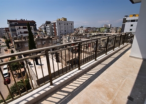 Квартира планировки 6+1 дуплекс в центре города Анталия 