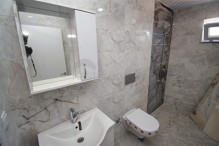 Квартиры планировки 1+1 и 2+1 в районе Кепез - Анталия 