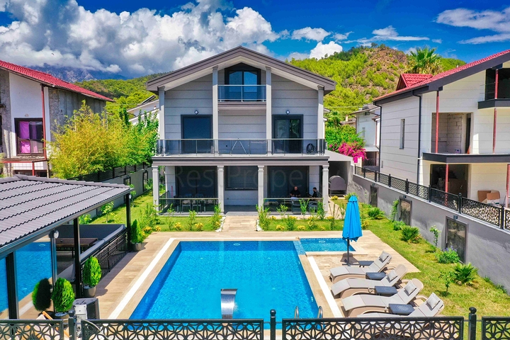 Просторная вилла планировки 4+1 в районе Кемер - Анталия 