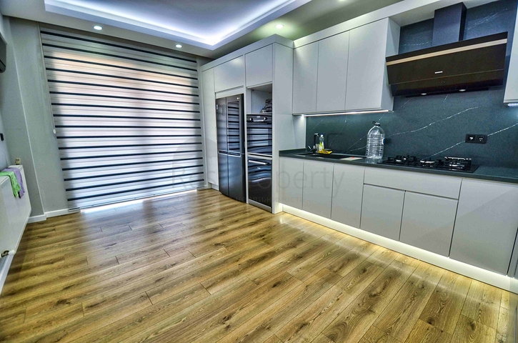 Просторная квартира планировки 4+1 в микрорайоне Унджалы - Анталия 