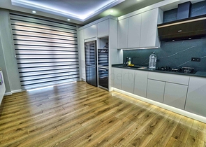 Просторная квартира планировки 4+1 в микрорайоне Унджалы - Анталия 