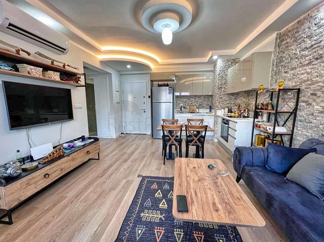 Уютная квартира планировки 1+1 в районе Кепез - Анталия 