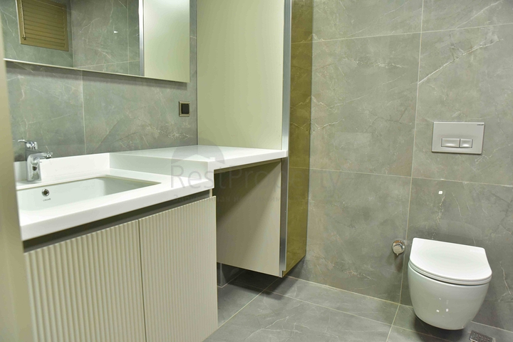 Квартира планировки 2+1 в центре города Анталия 