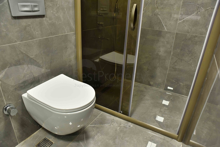 Квартира планировки 2+1 в центре города Анталия 