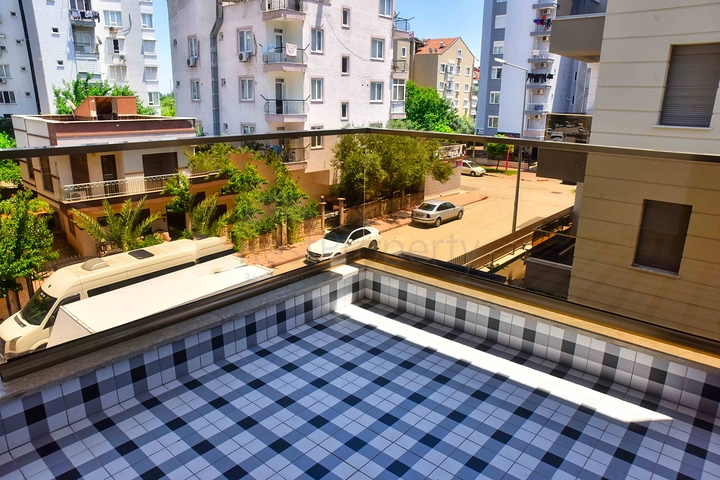 Квартира планировки 2+1 в центре города Анталия 