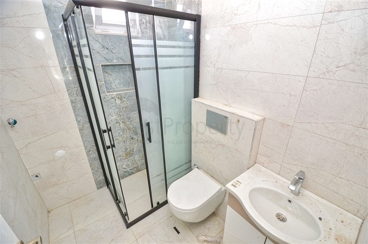 Квартиры планировки 2+1,3+1 в центре города Анталия 