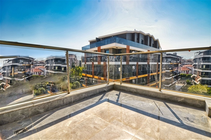 Квартира планировки 5+1 дуплекс в центре города Анталия 