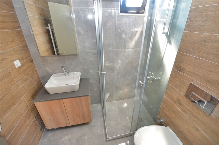 Квартира планировки 5+1 дуплекс в центре города Анталия 