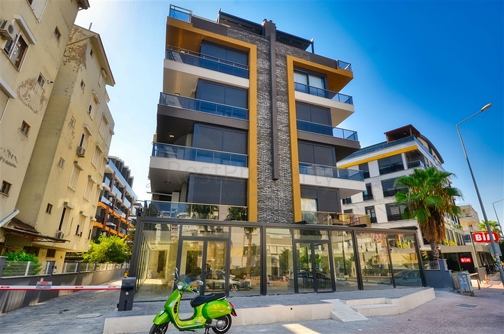 Квартира планировки 5+1 дуплекс в центре города Анталия 