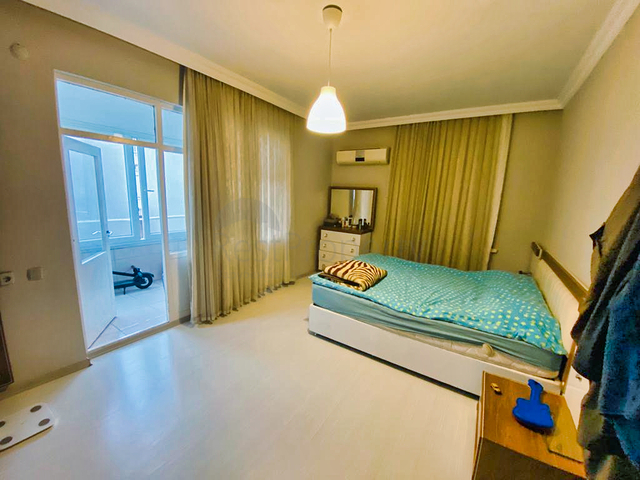 Квартира планировки 3+1 в центре города Анталия 