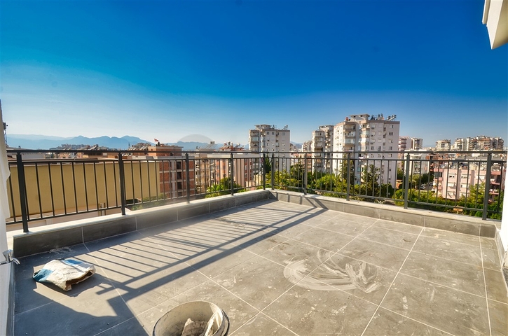 Квартиры планировки 6+1 в центре города Анталия 