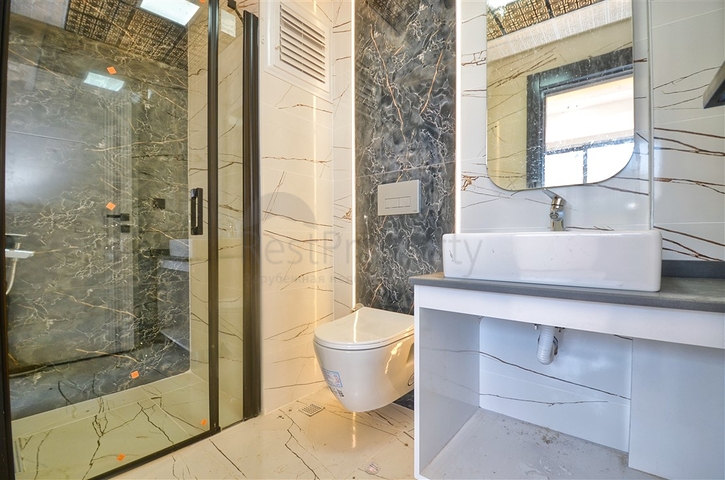 Квартиры планировки 6+1 в центре города Анталия 