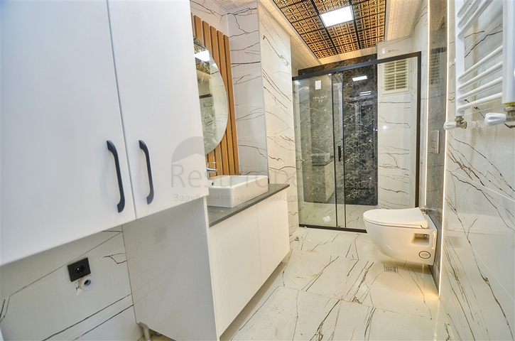 Квартиры планировки 6+1 в центре города Анталия 