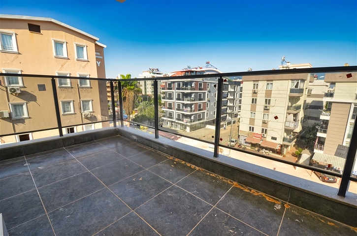 Квартиры планировки 6+1 в центре города Анталия 