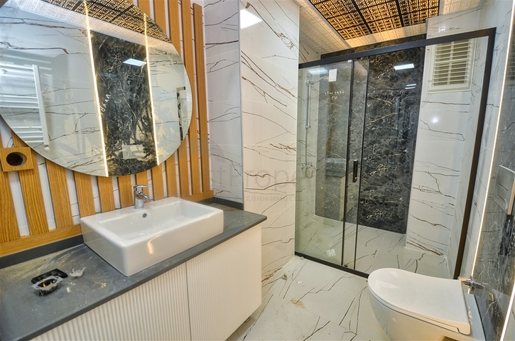 Квартиры планировки 6+1 в центре города Анталия 