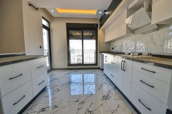 Квартиры планировки 6+1 в центре города Анталия 