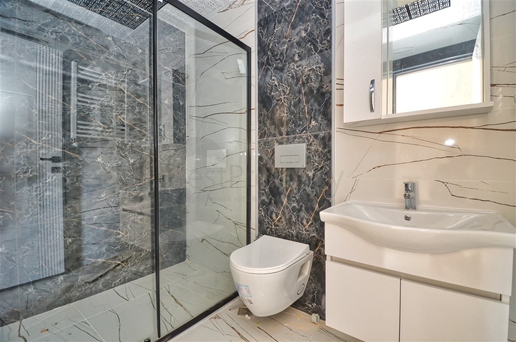 Квартиры планировки 6+1 в центре города Анталия 