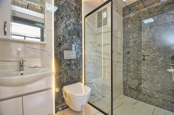 Квартиры планировки 6+1 в центре города Анталия 