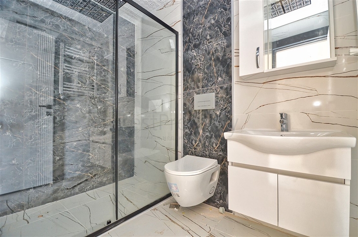 Квартиры планировки 6+1 в центре города Анталия 