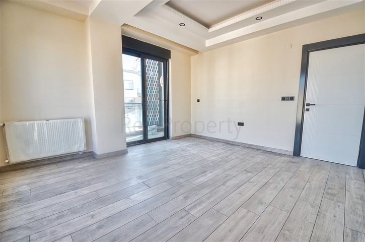 Квартиры планировки 6+1 в центре города Анталия 