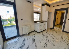 Квартиры планировки 6+1 в центре города Анталия 