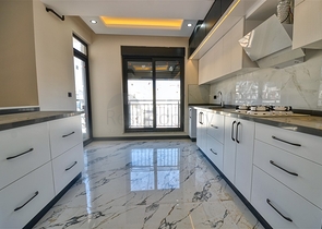 Квартиры планировки 6+1 в центре города Анталия 