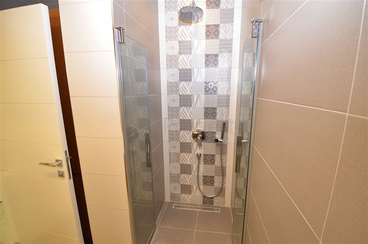 Квартира планировки 4+1 в микрорайоне Унджалы - Анталия 