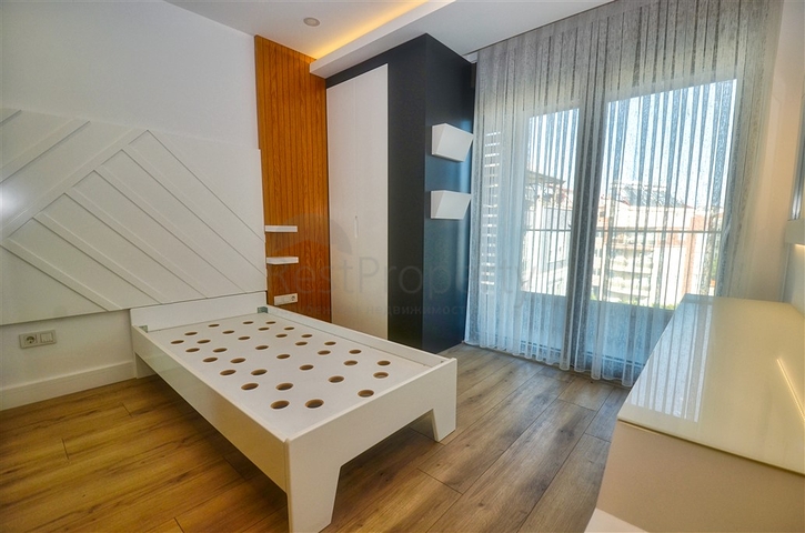 Квартира планировки 4+1 в микрорайоне Унджалы - Анталия 