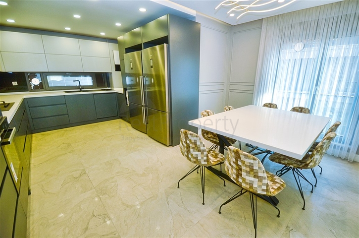 Квартира планировки 4+1 в микрорайоне Унджалы - Анталия 