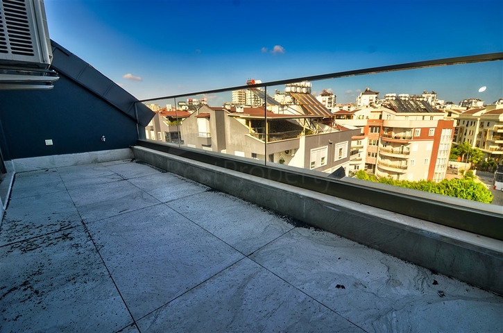 Квартира планировки 4+1 в микрорайоне Унджалы - Анталия 