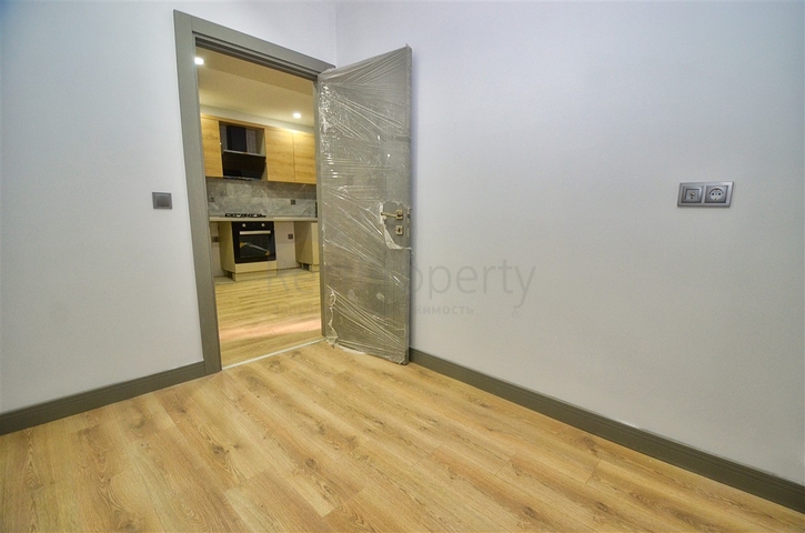 Квартира планировки 2+1 в центре города Анталия 