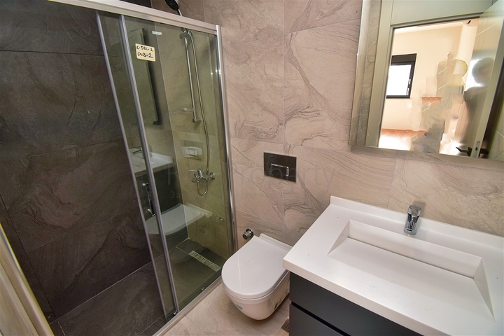 Квартира планировки 5+1 дуплекс в микрорайоне Унджалы - Анталия