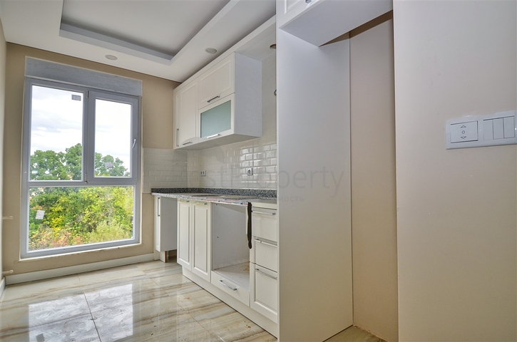 Квартира планировки 2+1 в микрорайоне Кызыларык - Анталия 