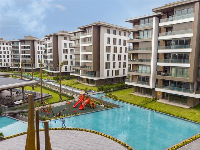 Квартира планировки 4+1 в комплексе класса люкс в районе Гюрсу - Анталия