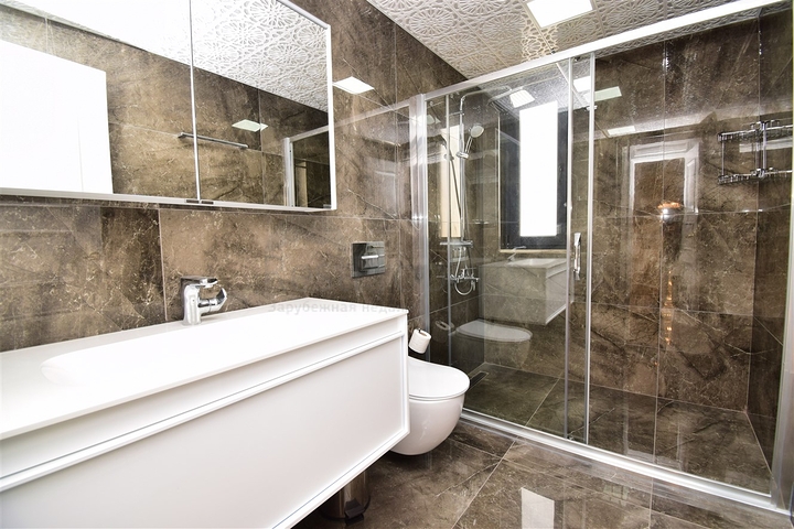 Вилла планировки 7+1 с гостевым домом 1+1 в районе Дошемеалты - Анталия