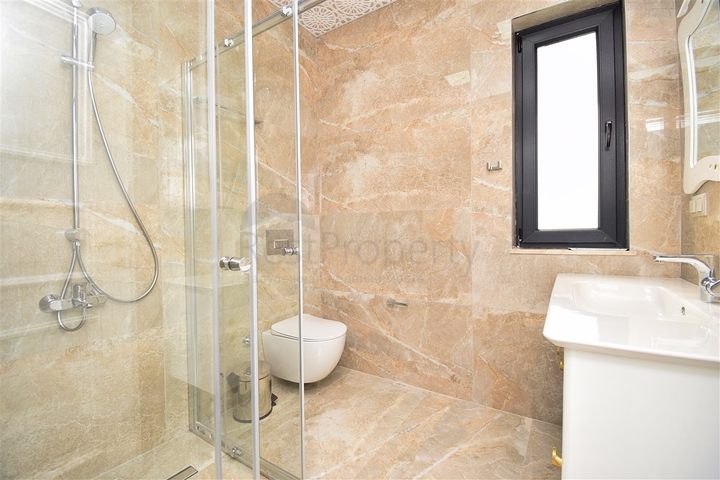 Вилла планировки 7+1 с гостевым домом 1+1 в районе Дошемеалты - Анталия