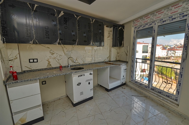 Квартиры планировки 1+1 и 2+1  в районе Кепез - Анталия 