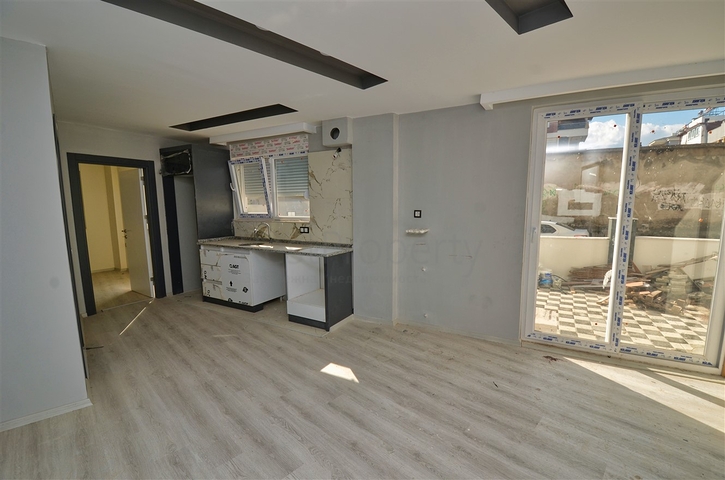 Квартиры планировки 1+1 и 2+1  в районе Кепез - Анталия 