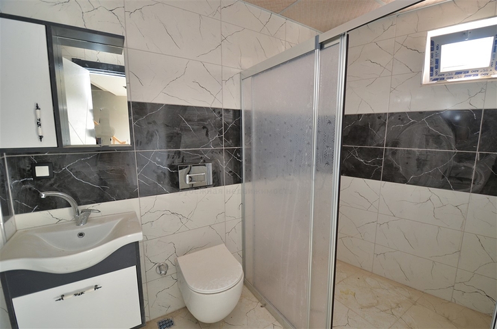 Квартиры планировки 1+1 и 2+1  в районе Кепез - Анталия 