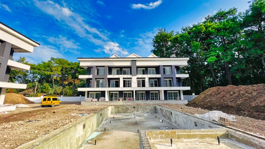 Квартира планировки 3+1 в районе Кемер - Анталия 