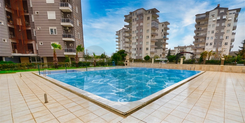 Квартира планировки 3+1 в микрорайоне Гюзельоба - Анталия 