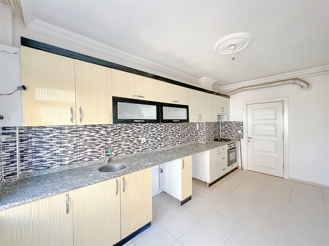 Квартира планировки 3+1 в микрорайоне Юксекалан - Анталия 