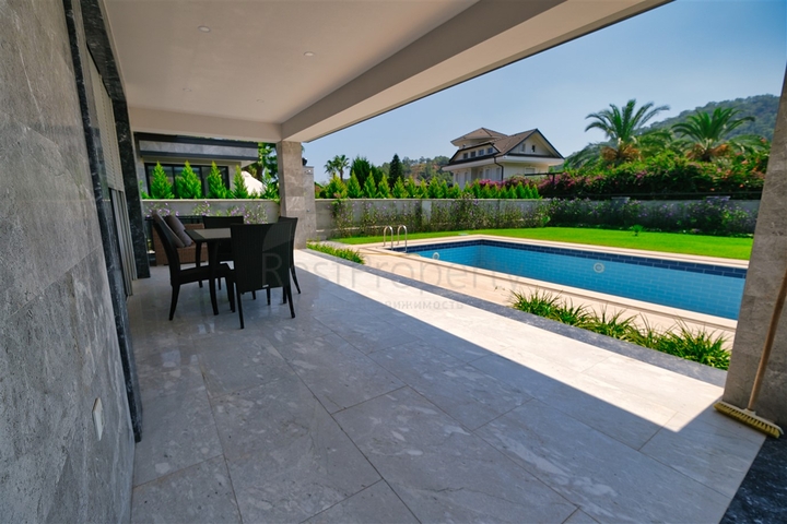 Вилла планировки 6+1 в районе Кемер - Анталия 